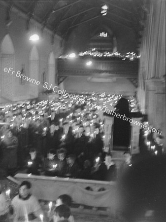 CHURCH INTERIOR CANDLE -LIT CLOSING OF MISSION